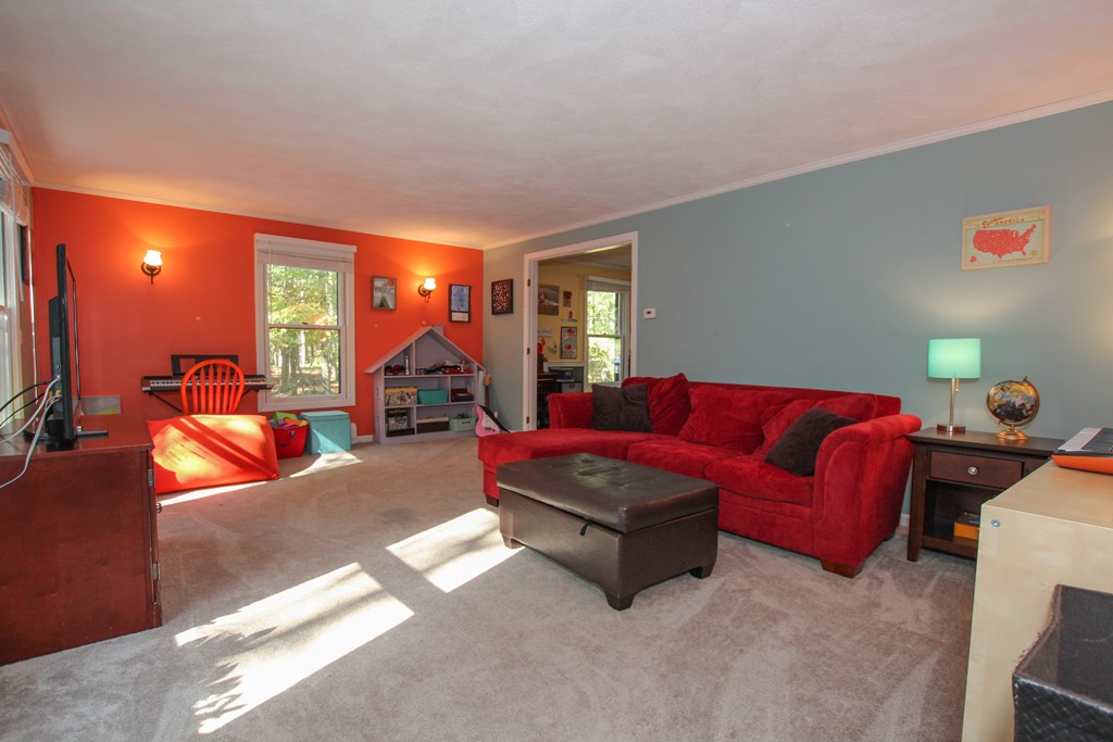 19 Coleman Road Newbury, MA 01922 - Photo 12 of 29 a living room with furniture and a lamp