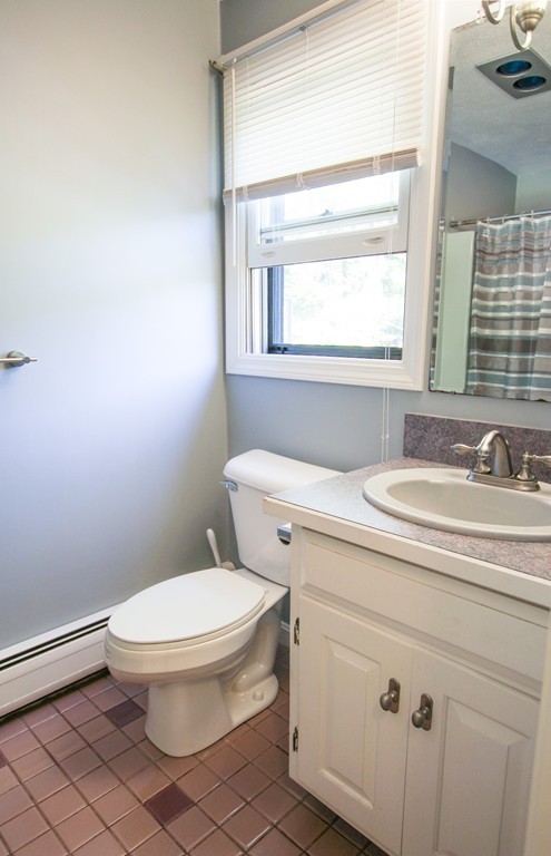 19 Coleman Road Newbury, MA 01922 - Photo 18 of 29 a bathroom with a granite countertop toilet sink and mirror