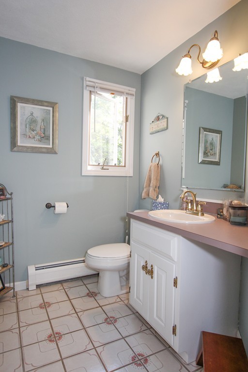 19 Coleman Road Newbury, MA 01922 - Photo 22 of 29 a bathroom with a toilet sink and mirror