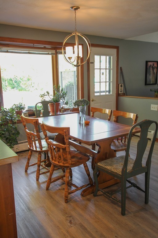 19 Coleman Road Newbury, MA 01922 - Photo 8 of 29 a view of a dining room with furniture window and wooden floor