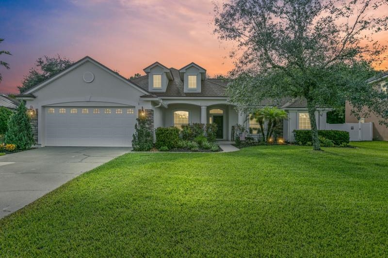 2724 North Portofino Road St. Augustine, FL 32092 - Photo 1 of 86 front view of house with a yard