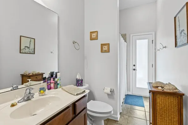 a white bath tub sitting next to a window