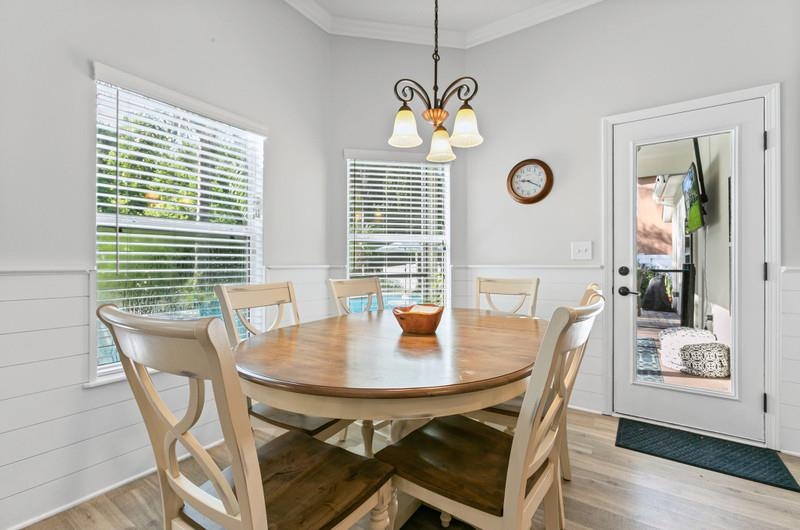 2724 North Portofino Road St. Augustine, FL 32092 - Photo 41 of 86 a view of a dining room with furniture window and wooden floor