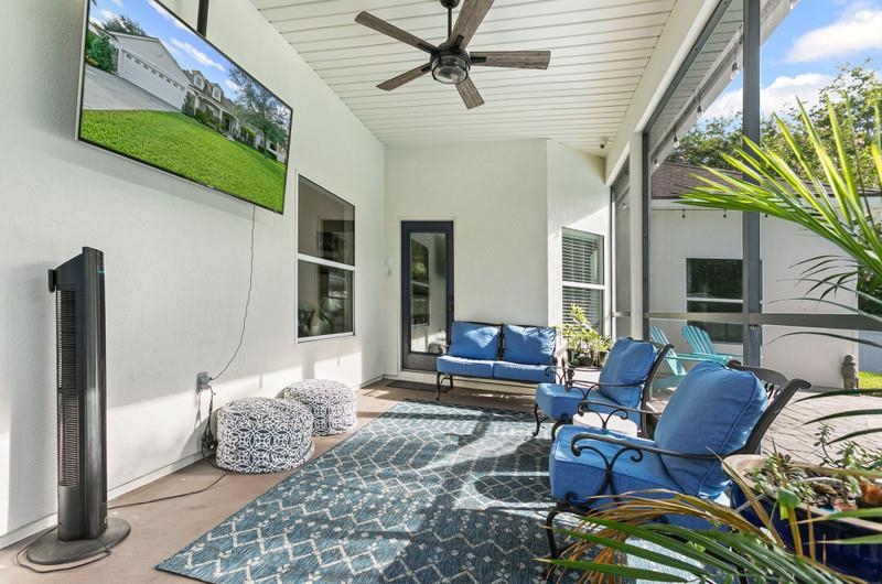 2724 North Portofino Road St. Augustine, FL 32092 - Photo 48 of 86 a living room with furniture and a potted plant