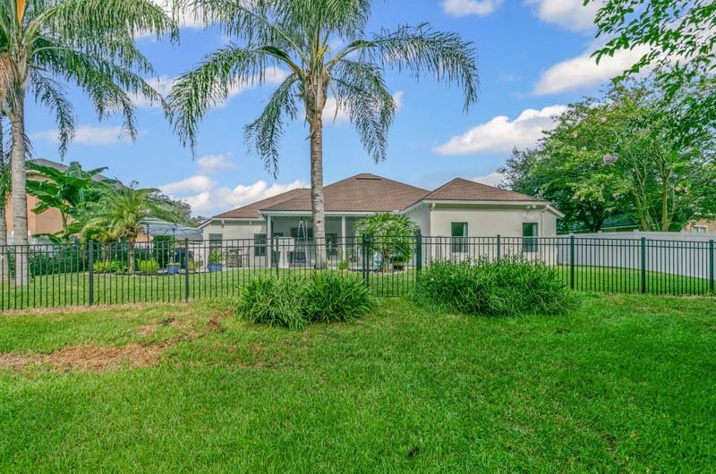2724 North Portofino Road St. Augustine, FL 32092 - Photo 59 of 86 a view of a yard in front of a house