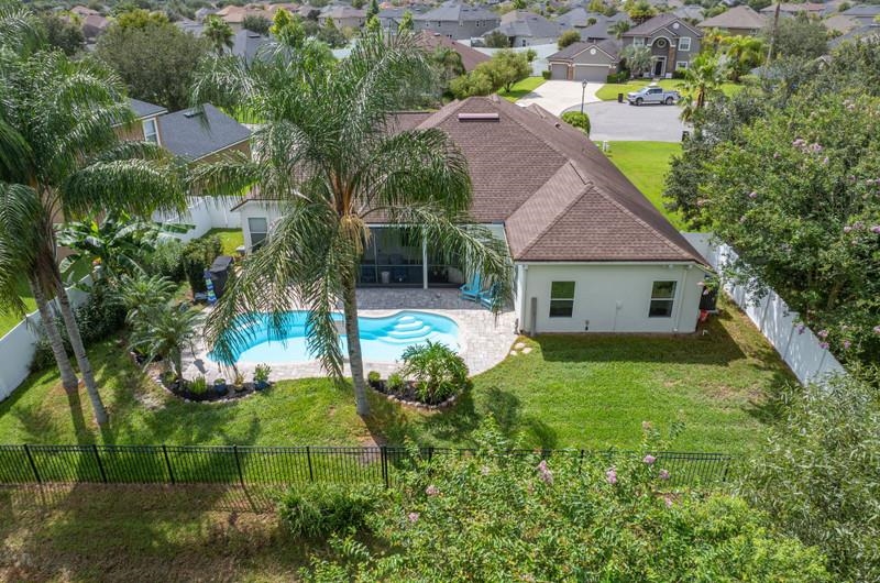 2724 North Portofino Road St. Augustine, FL 32092 - Photo 65 of 86 View of pool with a fenced backyard, a sunroom, a patio, and a residential view