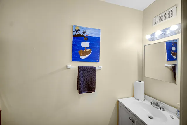 a bathroom with a toilet and a sink