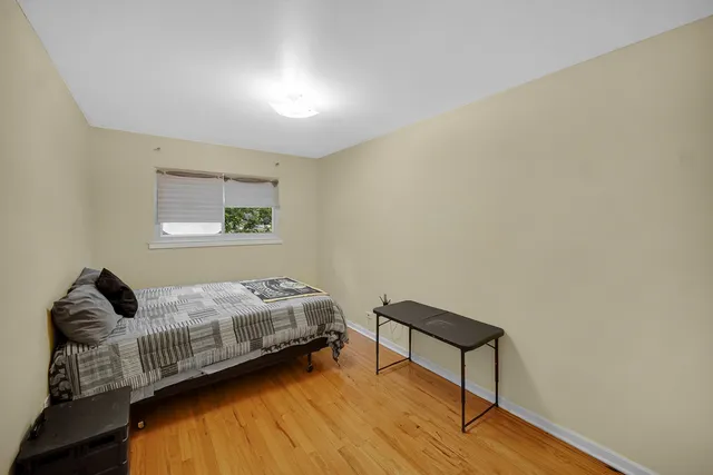 a bed room with a bed and a couch