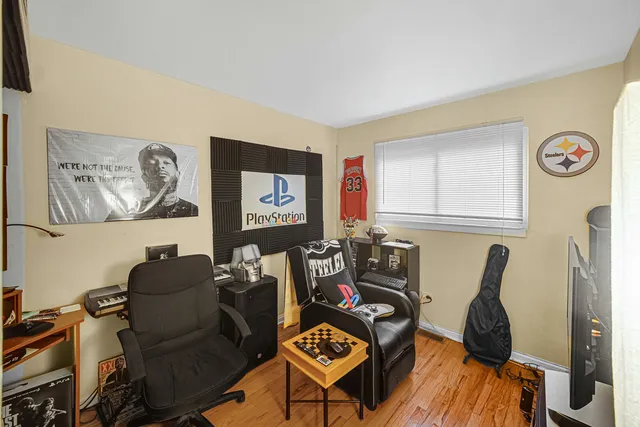 a room with furniture and flat screen tv