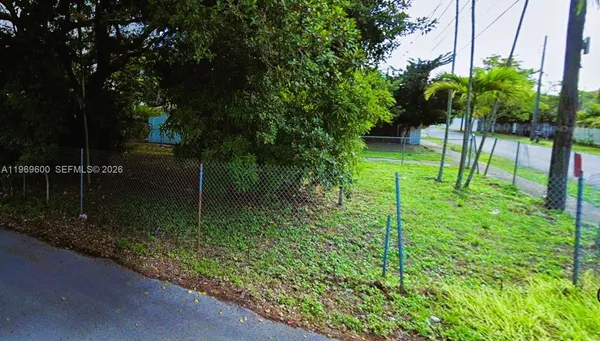 a view of backyard with green space