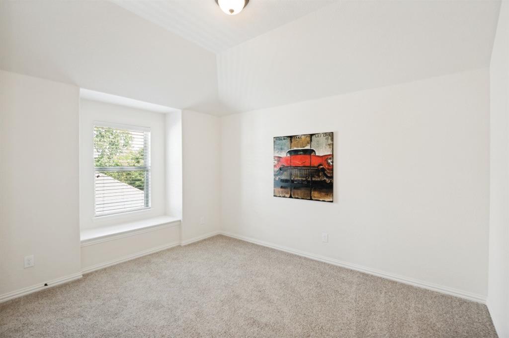 14215 Raspberry Lane Frisco, TX 75035 - Photo 21 of 30 Bright room featuring a window with integrated blinds, a window seat, and neutral-toned carpeting