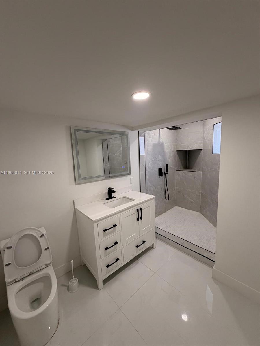 935 Southwest 72nd Avenue Miami, FL 33144 - Photo 16 of 17 a room with furniture and window