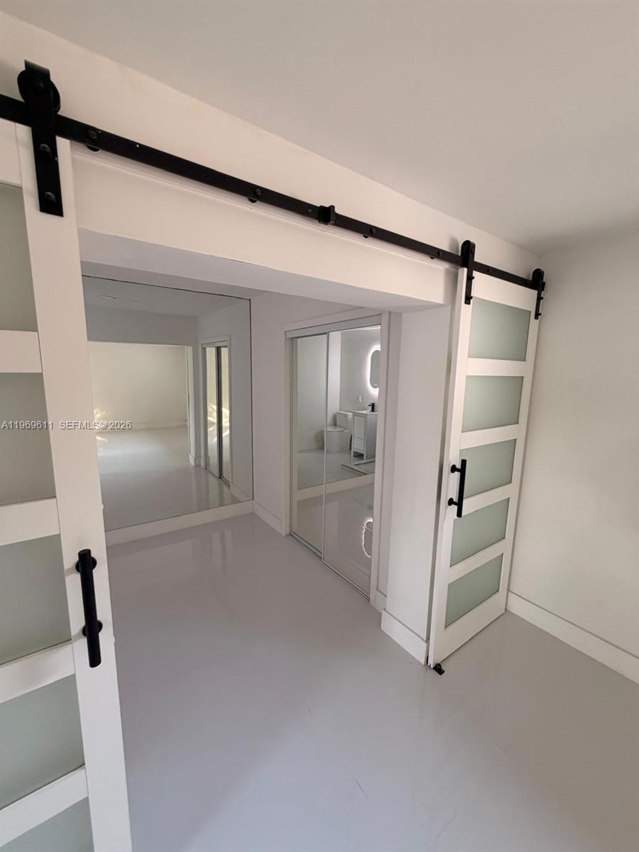 935 Southwest 72nd Avenue Miami, FL 33144 - Photo 17 of 17 wooden floor in an empty room