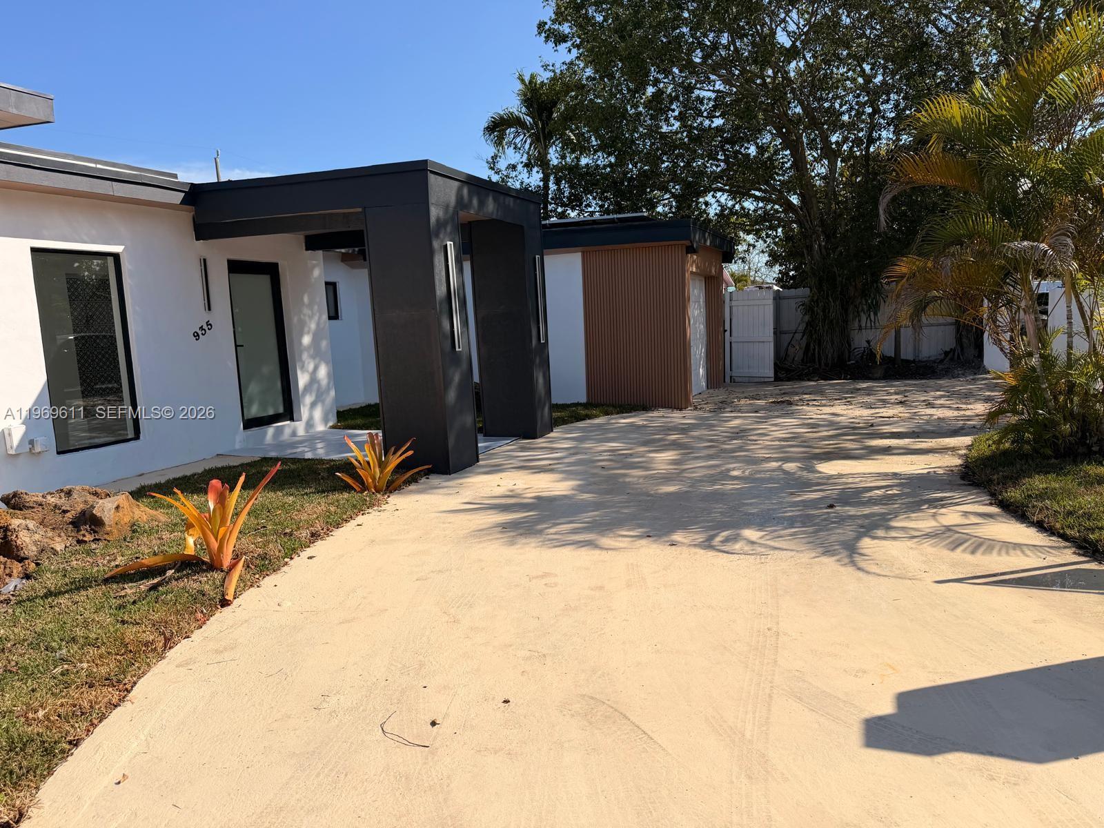 935 Southwest 72nd Avenue Miami, FL 33144 - Photo 2 of 17 a view of backyard of the house