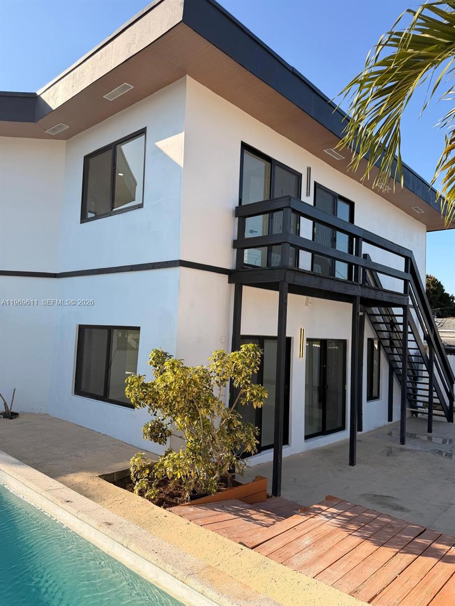 935 Southwest 72nd Avenue Miami, FL 33144 - Photo 4 of 17 a view of a porch