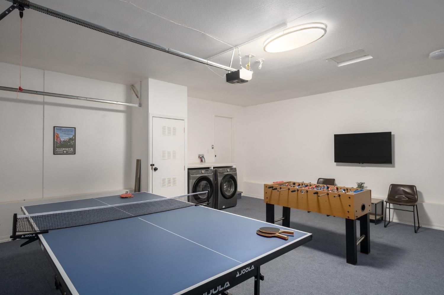 2811 East Westfall Road Mariposa, CA 95338 - Photo 17 of 25 a living room with furniture and a flat screen tv