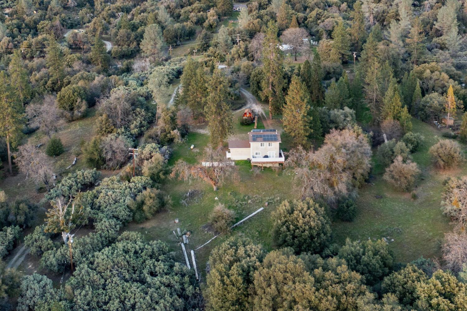 2811 East Westfall Road Mariposa, CA 95338 - Photo 23 of 25 an aerial view of residential house with outdoor space and trees all around