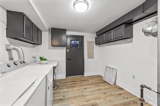 a kitchen with a sink a stove and refrigerator