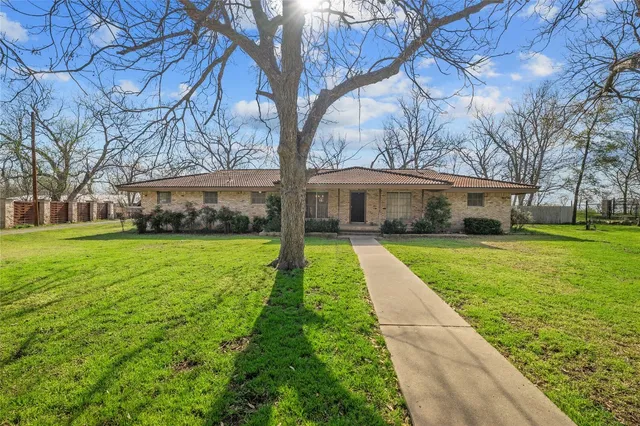 a front view of house with yard