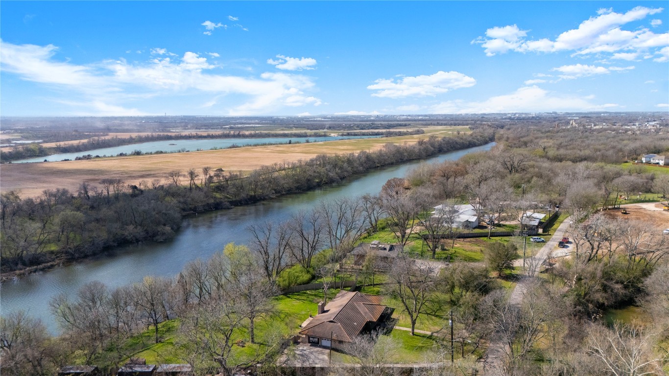 7705 Shelton Road Austin, TX 78725 - Photo 19 of 23 a view of a lake with outdoor space