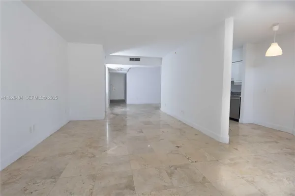 an empty room with an entryway