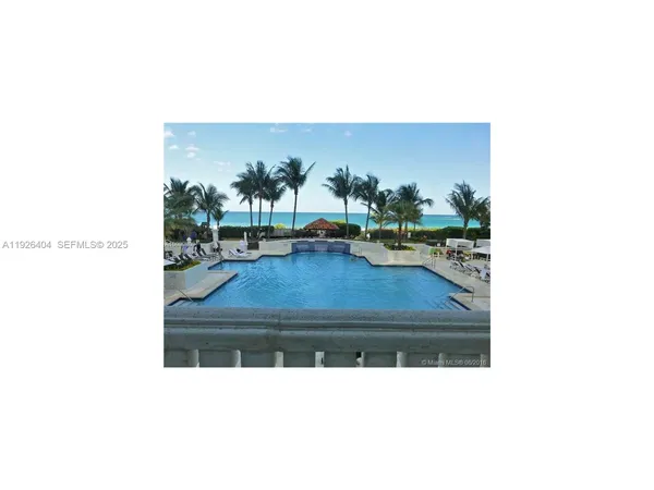 a outdoor living space with furniture and a potted plant