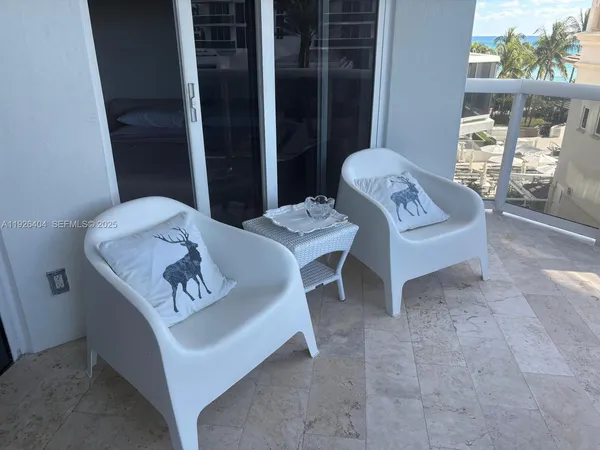 a view of livingroom with furniture and window