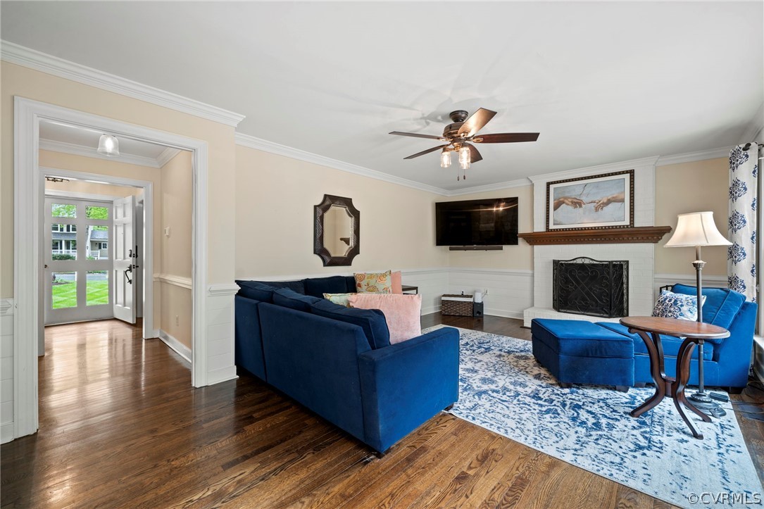 12516 Cutler Ridge Drive Henrico, VA 23233 - Photo 12 of 34 a living room with furniture a fireplace and a flat screen tv