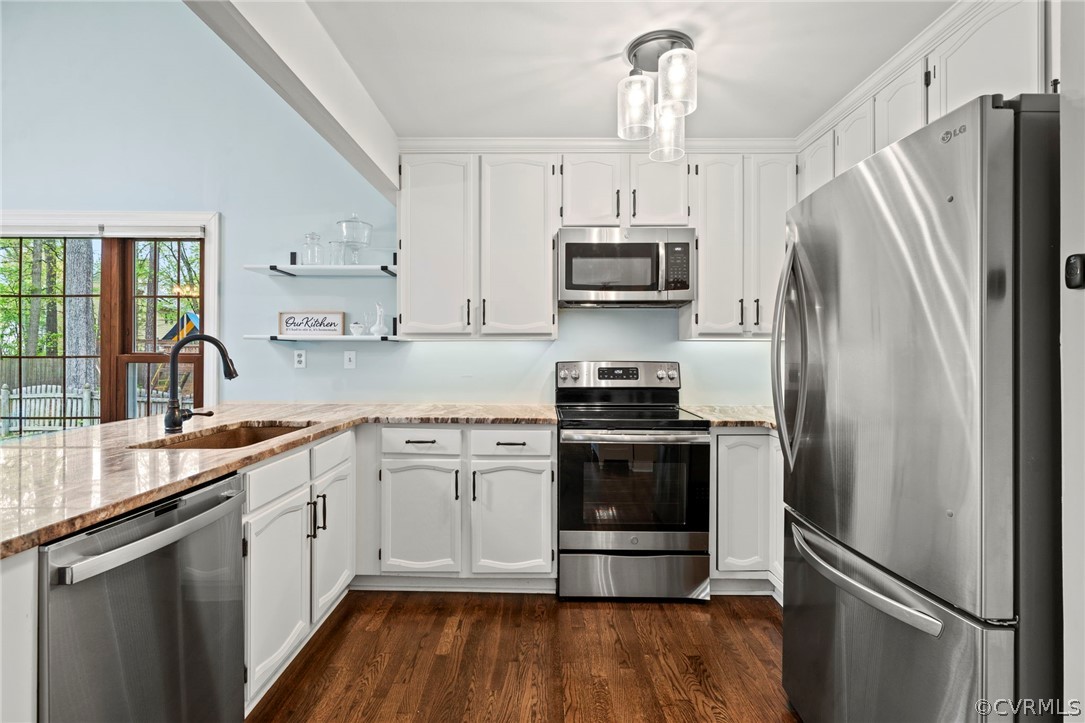 12516 Cutler Ridge Drive Henrico, VA 23233 - Photo 18 of 34 a kitchen with stainless steel appliances a refrigerator sink and microwave