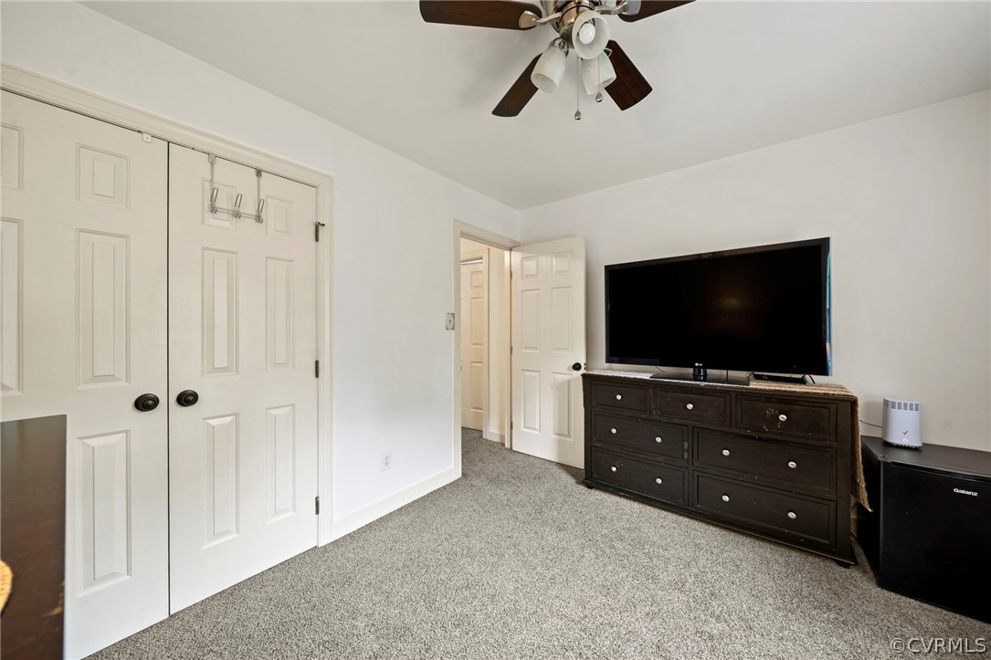 12516 Cutler Ridge Drive Henrico, VA 23233 - Photo 31 of 34 a room with a flat screen tv on dresser and a flat screen tv