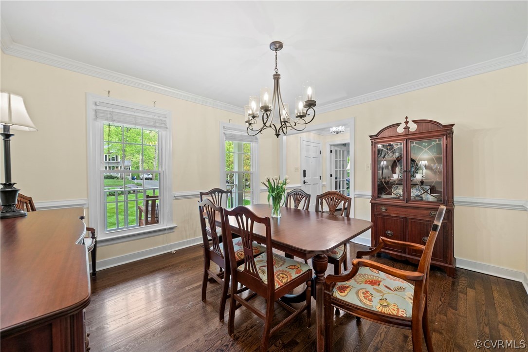 12516 Cutler Ridge Drive Henrico, VA 23233 - Photo 10 of 34 a dining room with furniture a chandelier and wooden floor