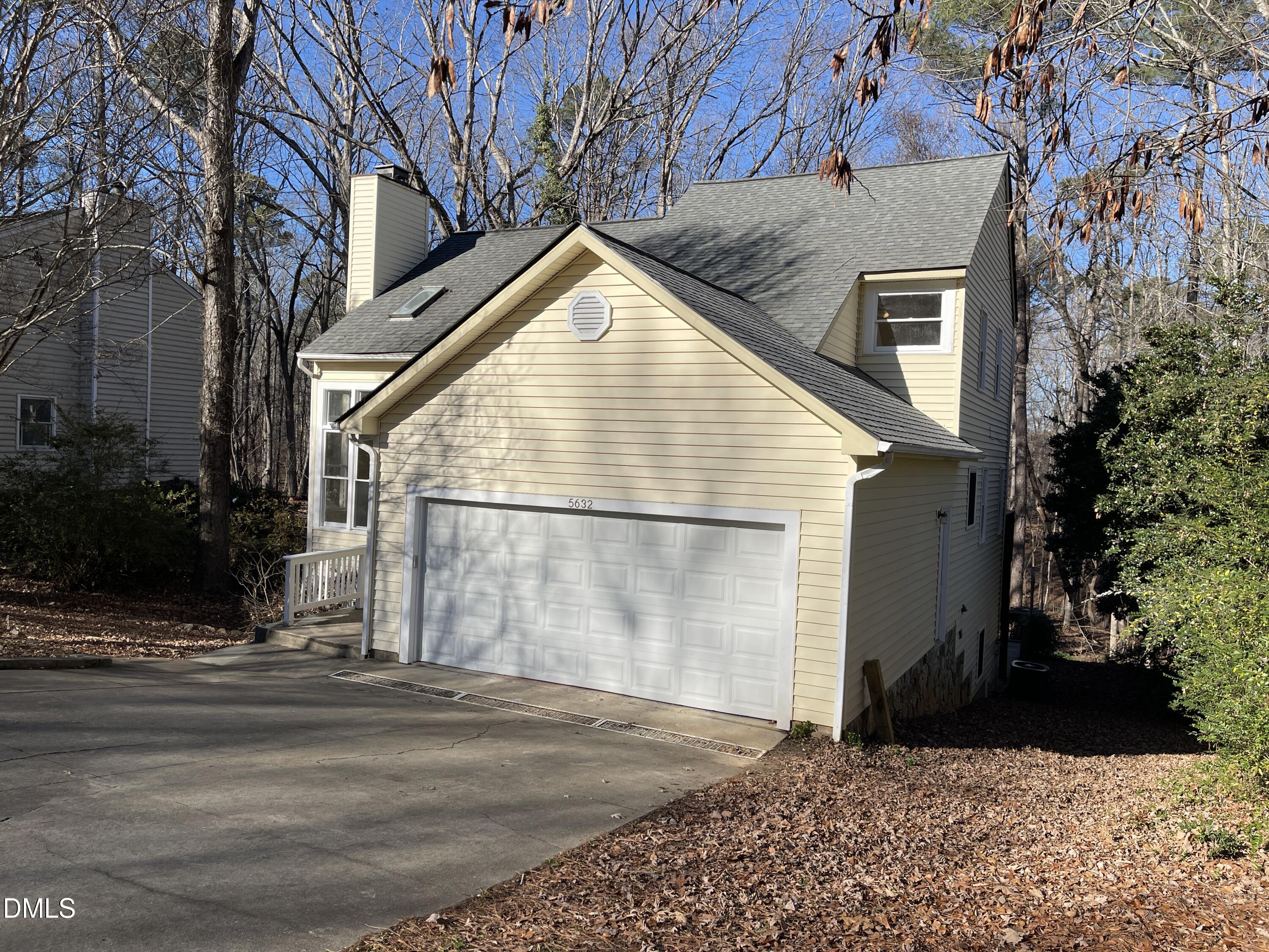 5632 Millrace Trail Raleigh, NC 27606 - Photo 2 of 26 a view of a house with a yard