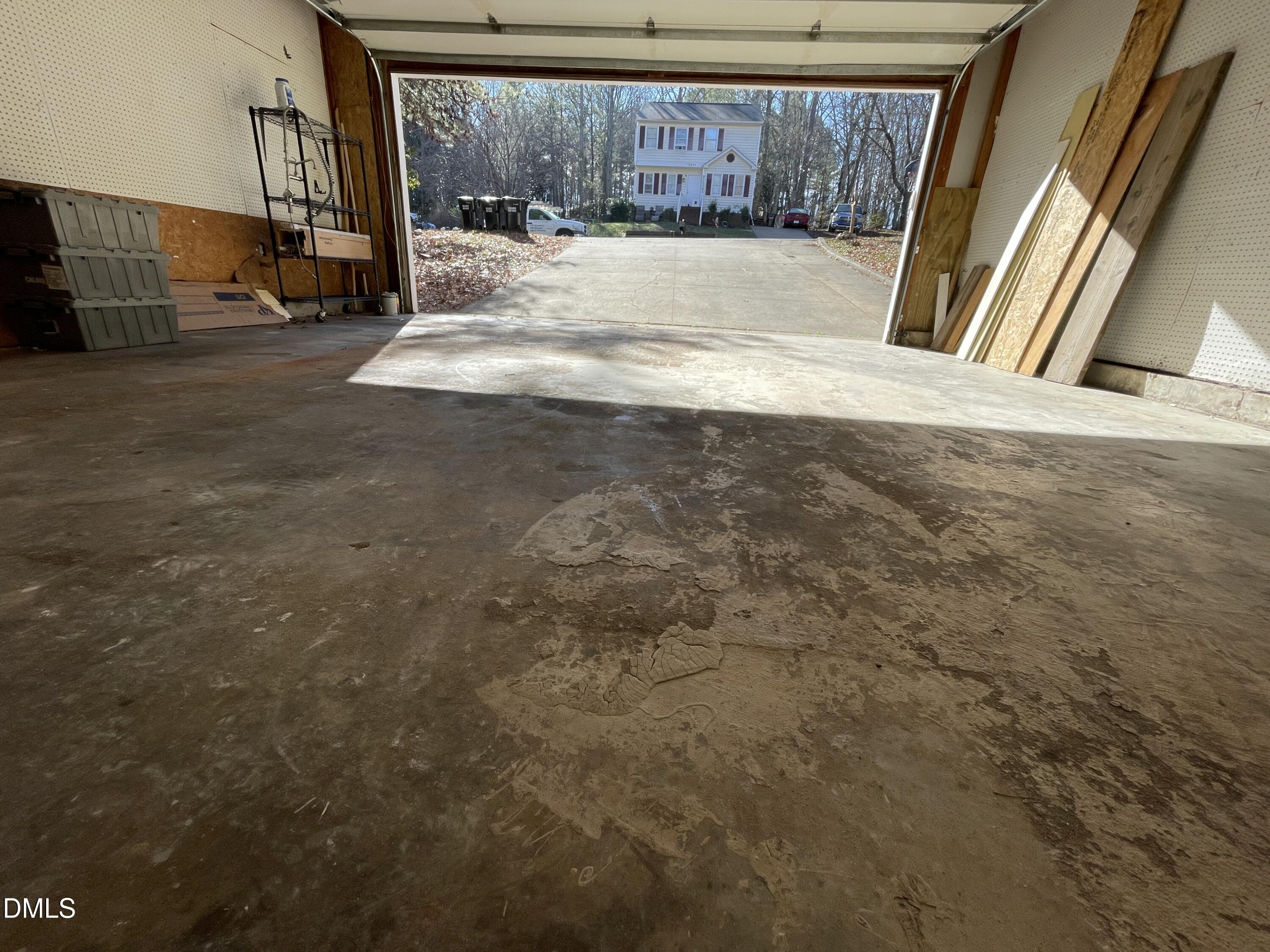 5632 Millrace Trail Raleigh, NC 27606 - Photo 26 of 26 a view of empty room with wooden floor and fan