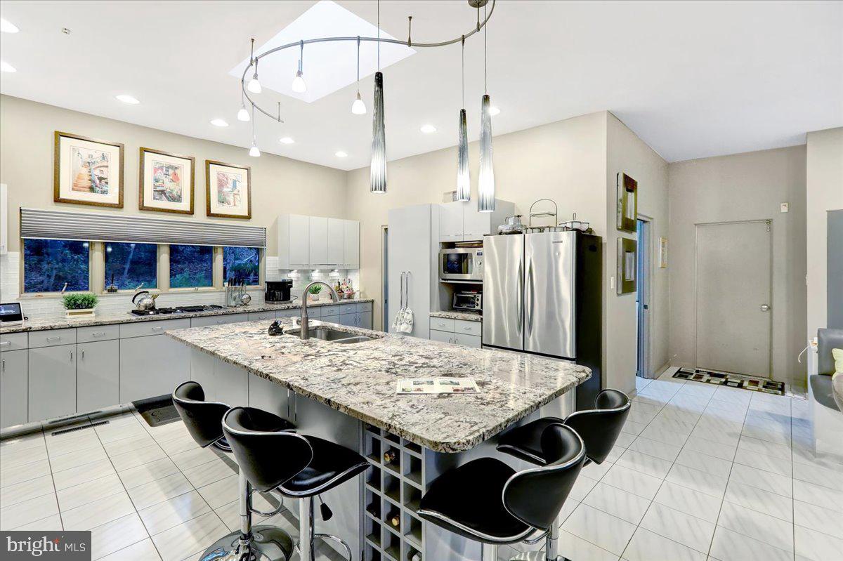 14 Pine Ridge Lane Reading, PA 19607 - Photo 12 of 66 a large kitchen with a table and chairs