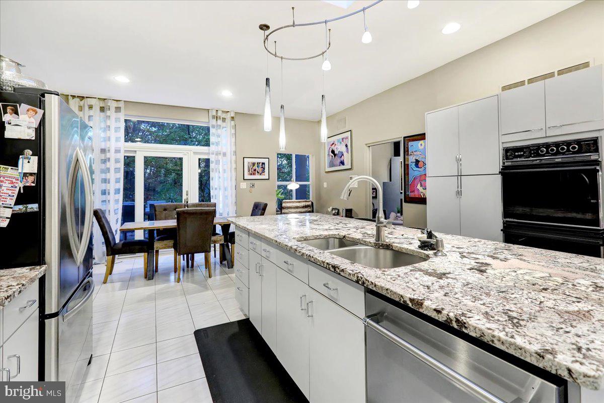 14 Pine Ridge Lane Reading, PA 19607 - Photo 16 of 66 a kitchen with stainless steel appliances granite countertop a sink and cabinets