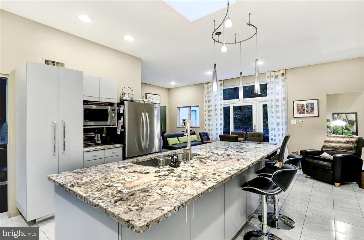 14 Pine Ridge Lane Reading, PA 19607 - Photo 17 of 66 a kitchen with stainless steel appliances granite countertop a sink stove and refrigerator