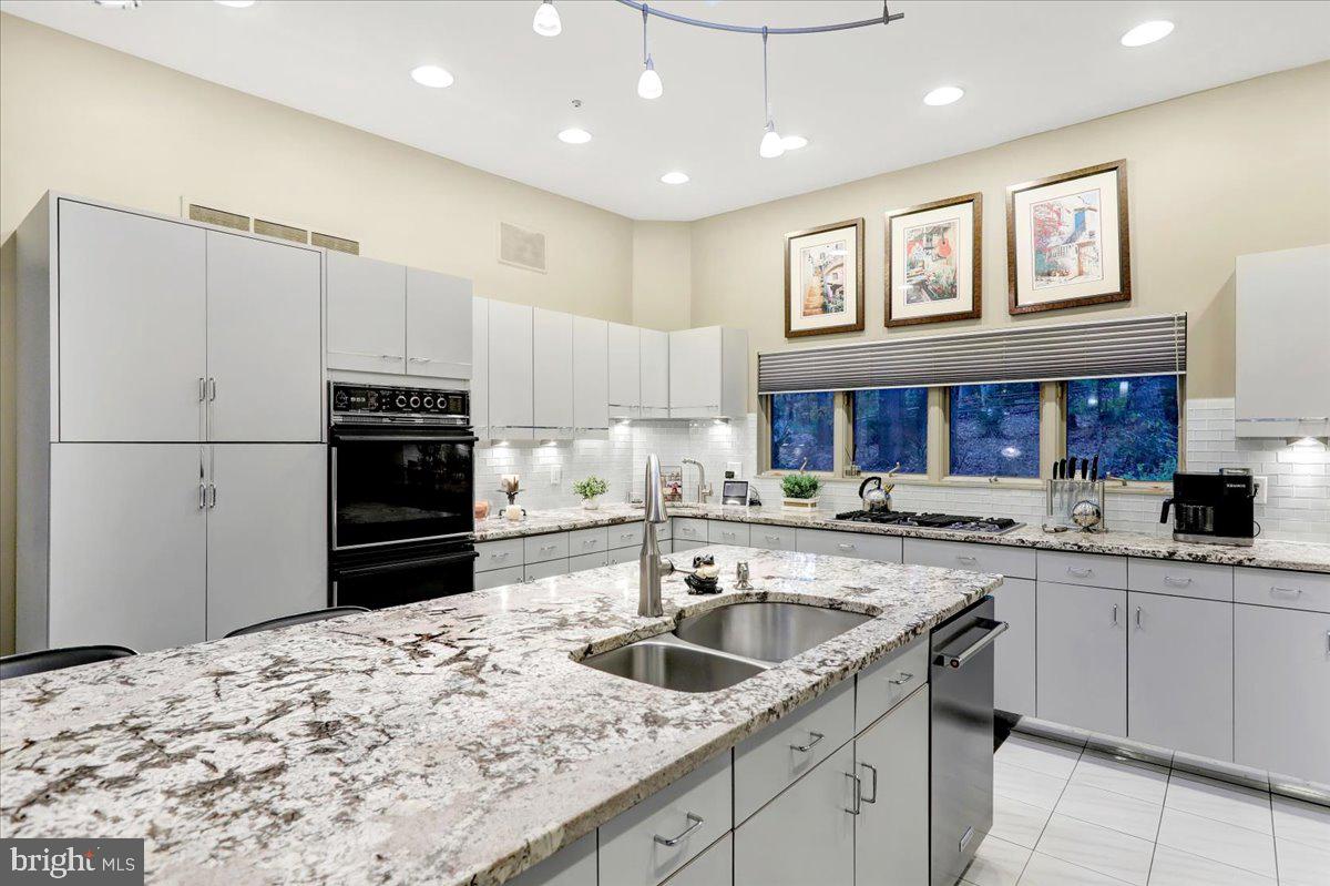 14 Pine Ridge Lane Reading, PA 19607 - Photo 18 of 66 a kitchen with granite countertop a sink stove and refrigerator