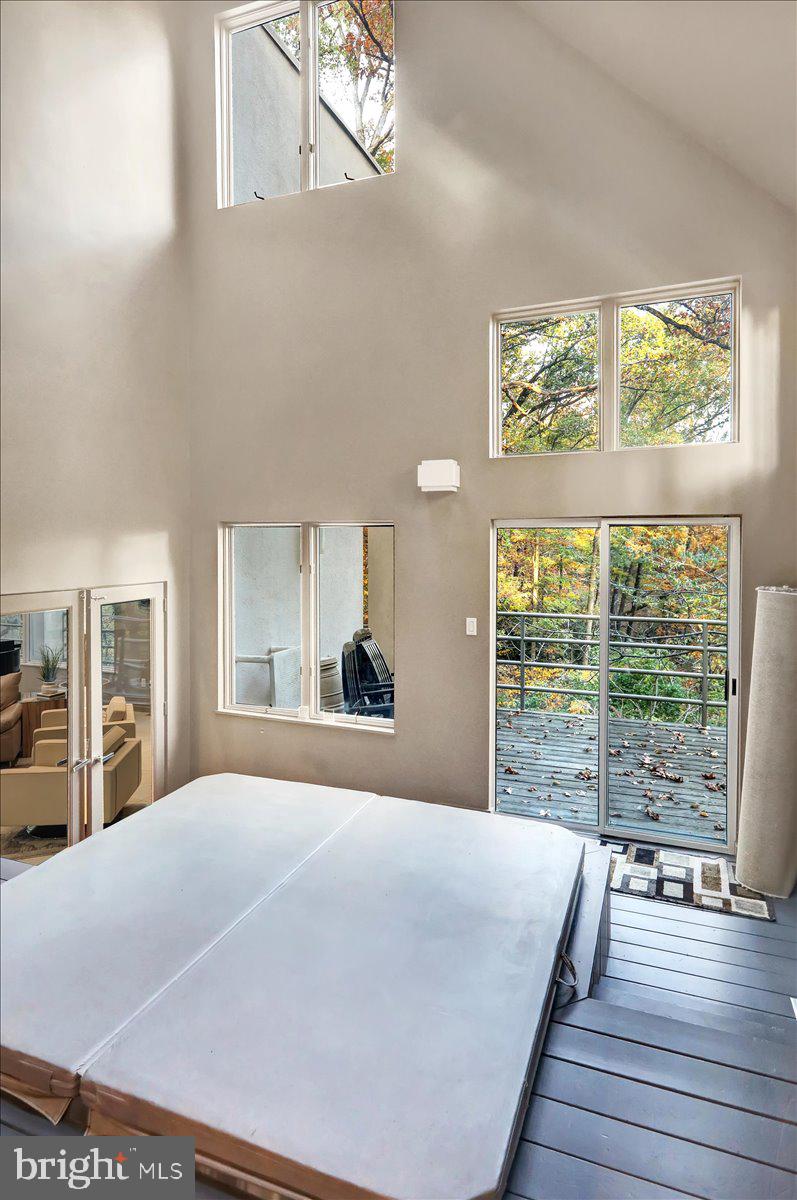 14 Pine Ridge Lane Reading, PA 19607 - Photo 32 of 66 a bedroom with a large bed and a large window