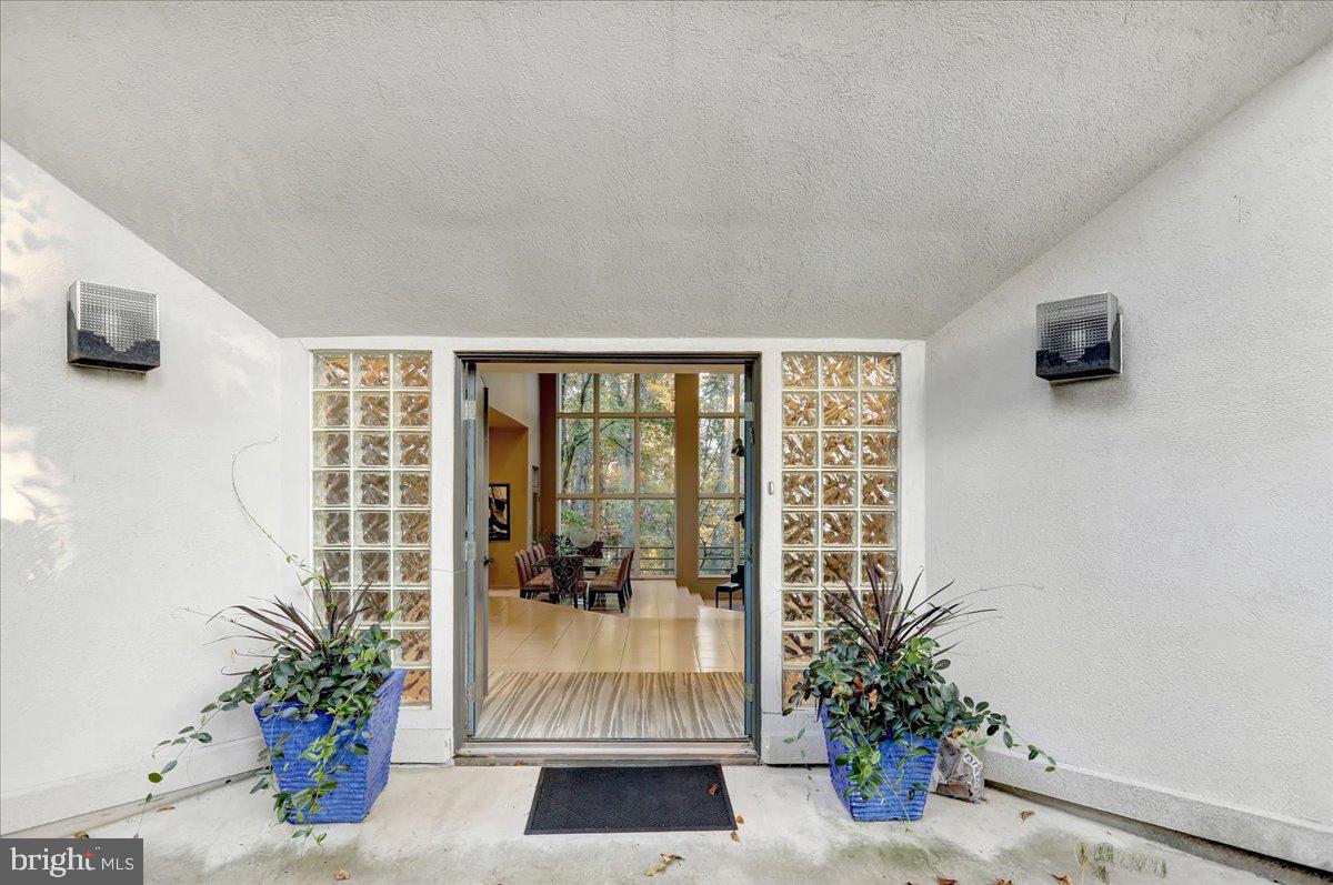 14 Pine Ridge Lane Reading, PA 19607 - Photo 4 of 66 a view of front door and potted plants