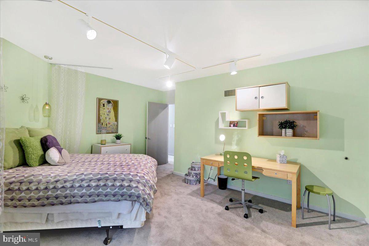 14 Pine Ridge Lane Reading, PA 19607 - Photo 47 of 66 a bedroom with a large bed and a desk