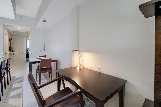 a view of a workspace with furniture