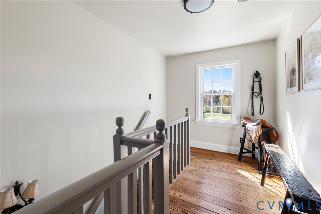 6256 Old Buckingham Road Powhatan, VA 23139 - Photo 29 of 48 a view of a room with furniture and wooden floor