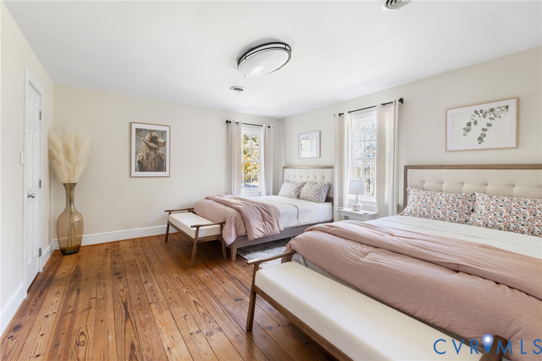 6256 Old Buckingham Road Powhatan, VA 23139 - Photo 31 of 48 a bedroom with two beds and a window