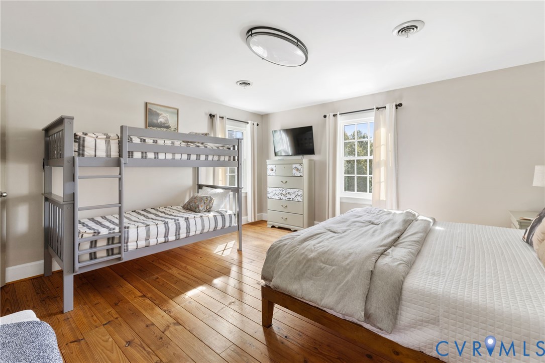 6256 Old Buckingham Road Powhatan, VA 23139 - Photo 35 of 48 a bedroom with a bed and window