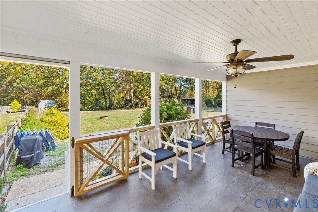 6256 Old Buckingham Road Powhatan, VA 23139 - Photo 36 of 48 a view of a dining room with furniture window and outside view