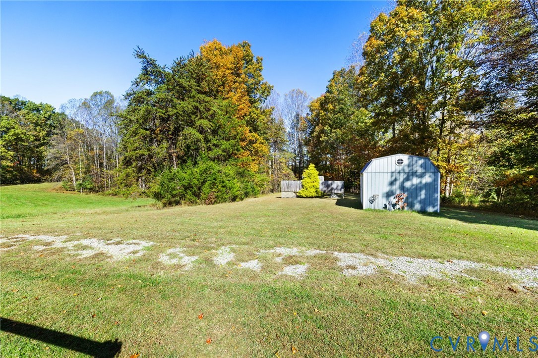 6256 Old Buckingham Road Powhatan, VA 23139 - Photo 38 of 48 a view of a field with large trees