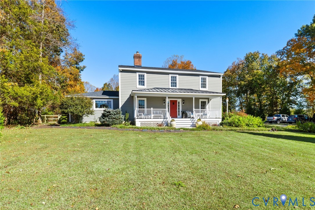 6256 Old Buckingham Road Powhatan, VA 23139 - Photo 4 of 48 a view of a house with a outdoor space