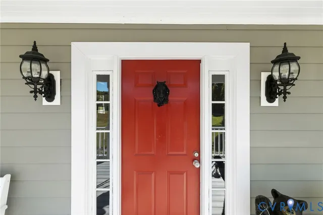 a vase of flowers sitting on a shelf