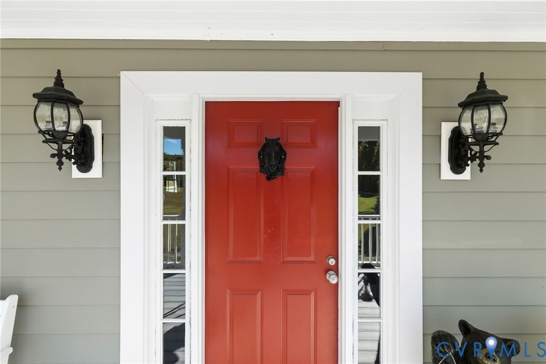 6256 Old Buckingham Road Powhatan, VA 23139 - Photo 6 of 48 a vase of flowers sitting on a shelf