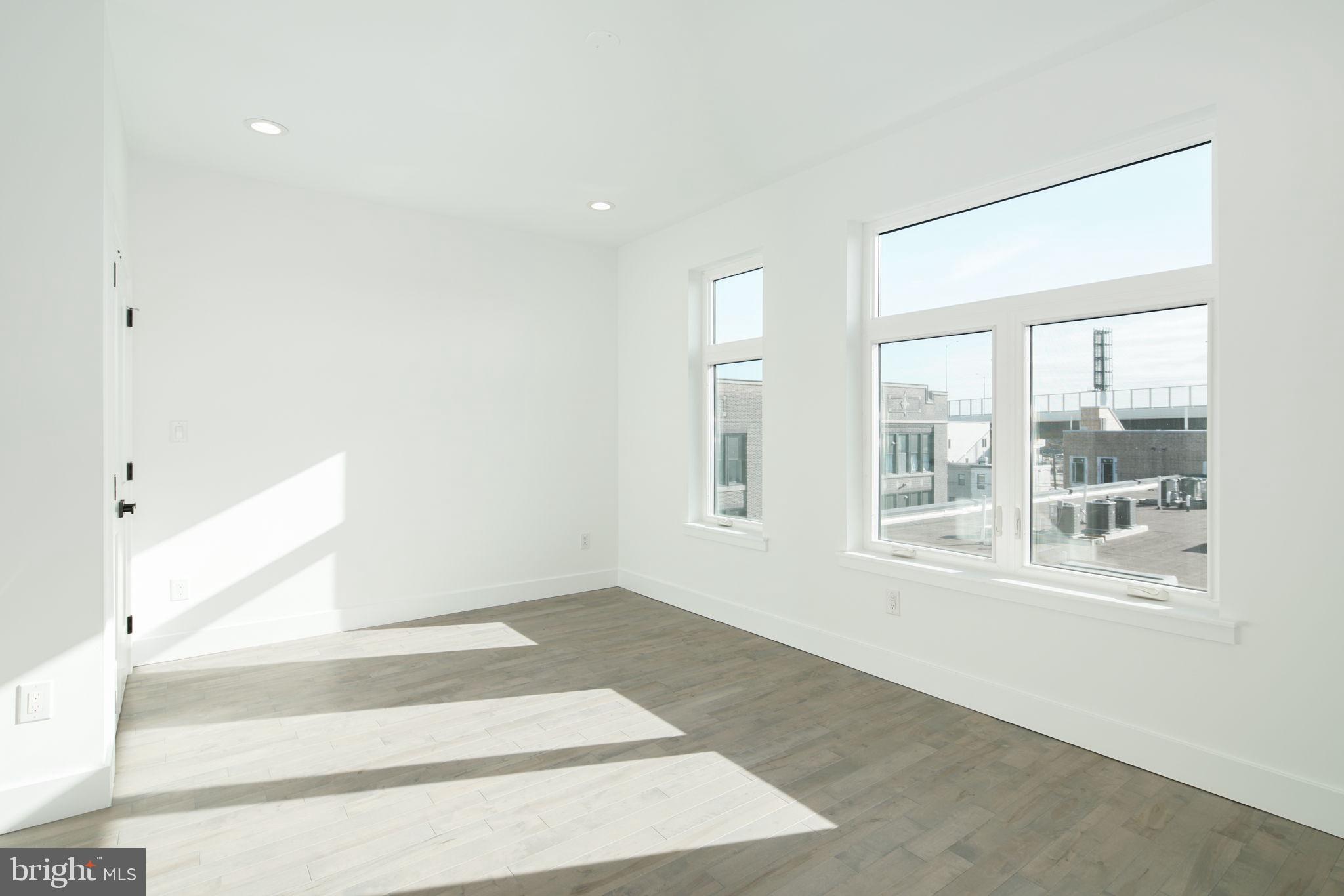 2827 Edgemont Street Philadelphia, PA 19134 - Photo 18 of 25 a view of an empty room with a window